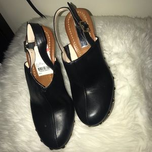 Black INC clog, size 6 .